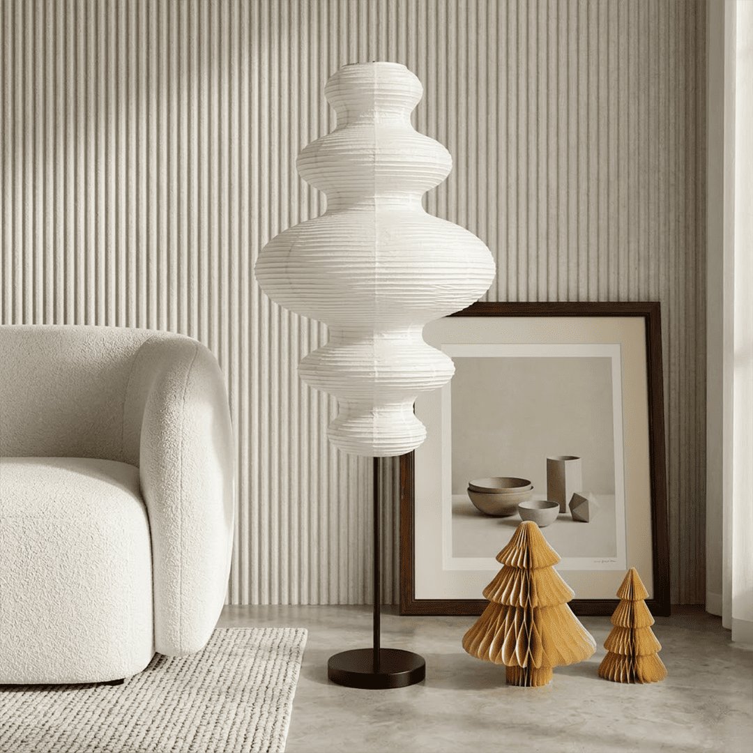 Handcrafted Chigiri Washi paper tower floor lamp with hand-torn mulberry paper texture and matte black base.