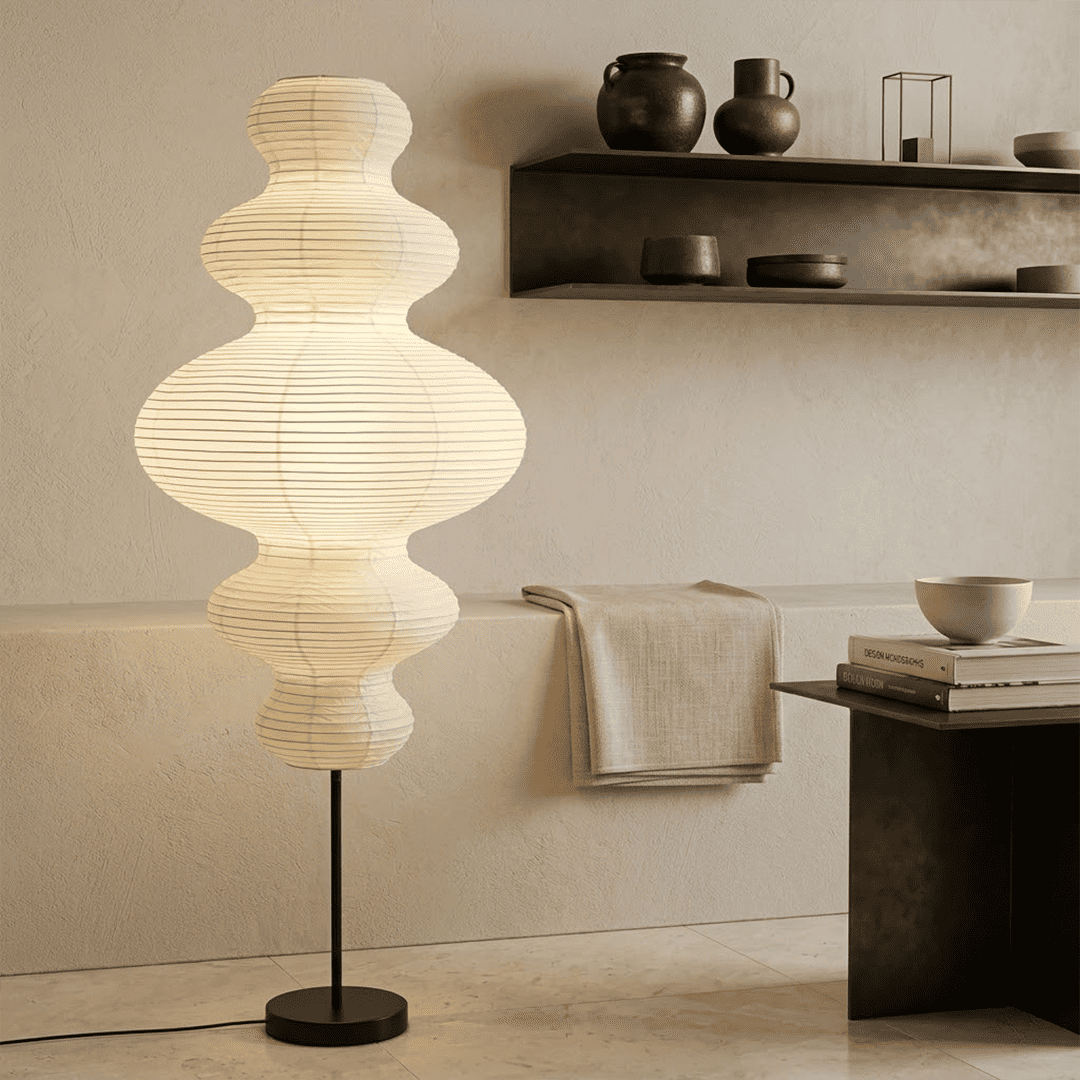 Handcrafted Chigiri Washi paper tower floor lamp with hand-torn mulberry paper texture and matte black base.