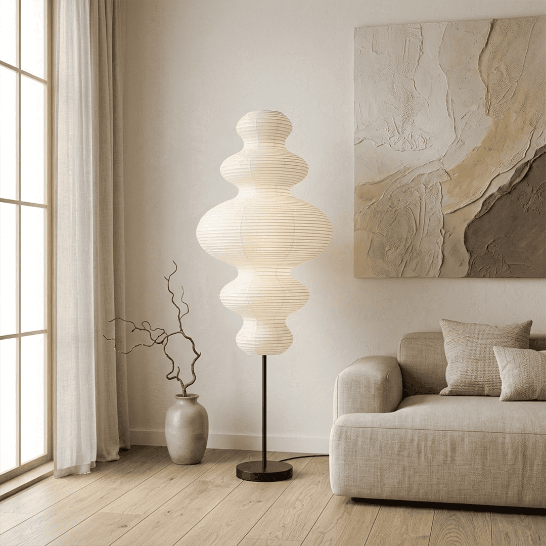Handcrafted Chigiri Washi paper tower floor lamp with hand-torn mulberry paper texture and matte black base.