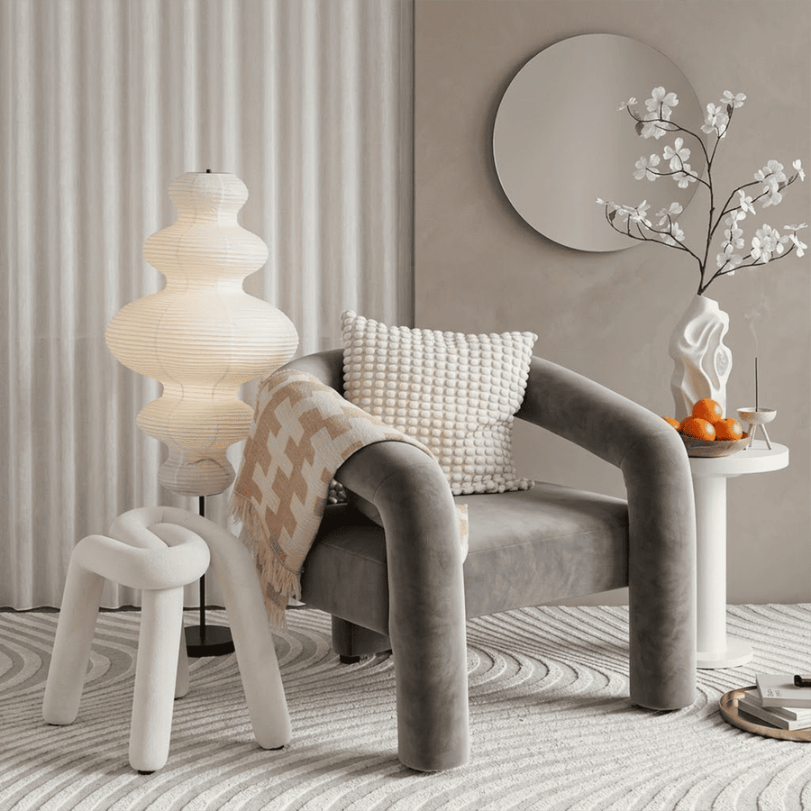 Handcrafted Chigiri Washi paper tower floor lamp with hand-torn mulberry paper texture and matte black base.