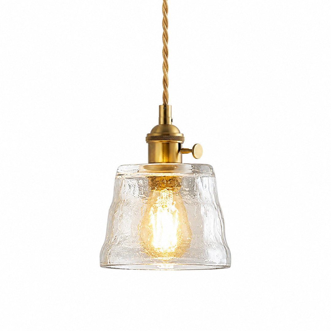 Clear textured glass pendant light antique brass socket white background