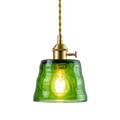 Forest green hammered glass pendant light antique brass white background