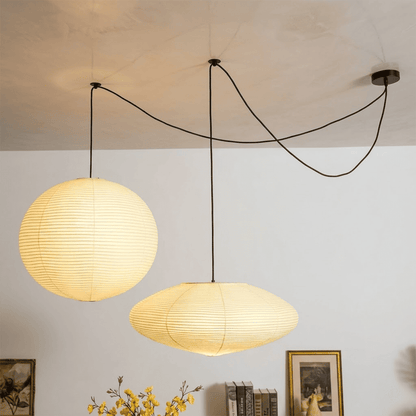 Handcrafted Whimsy 2-light Washi paper spider pendant lamp with sphere and oval shades for Japandi living room.