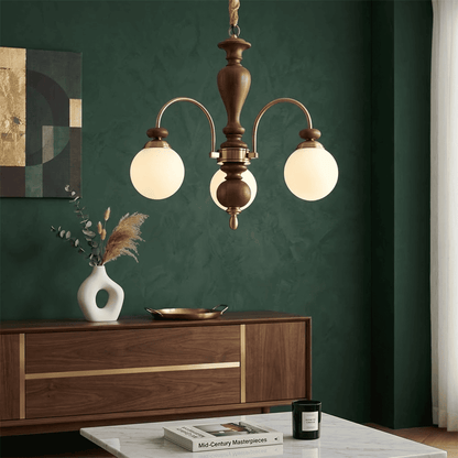 Windsor walnut chandelier  above dining table warm glowing light living room
