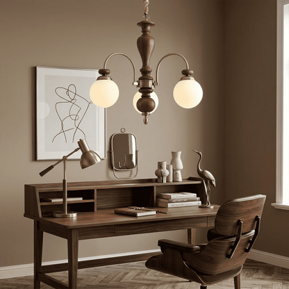 Windsor walnut chandelier  above dining table warm glowing light living room