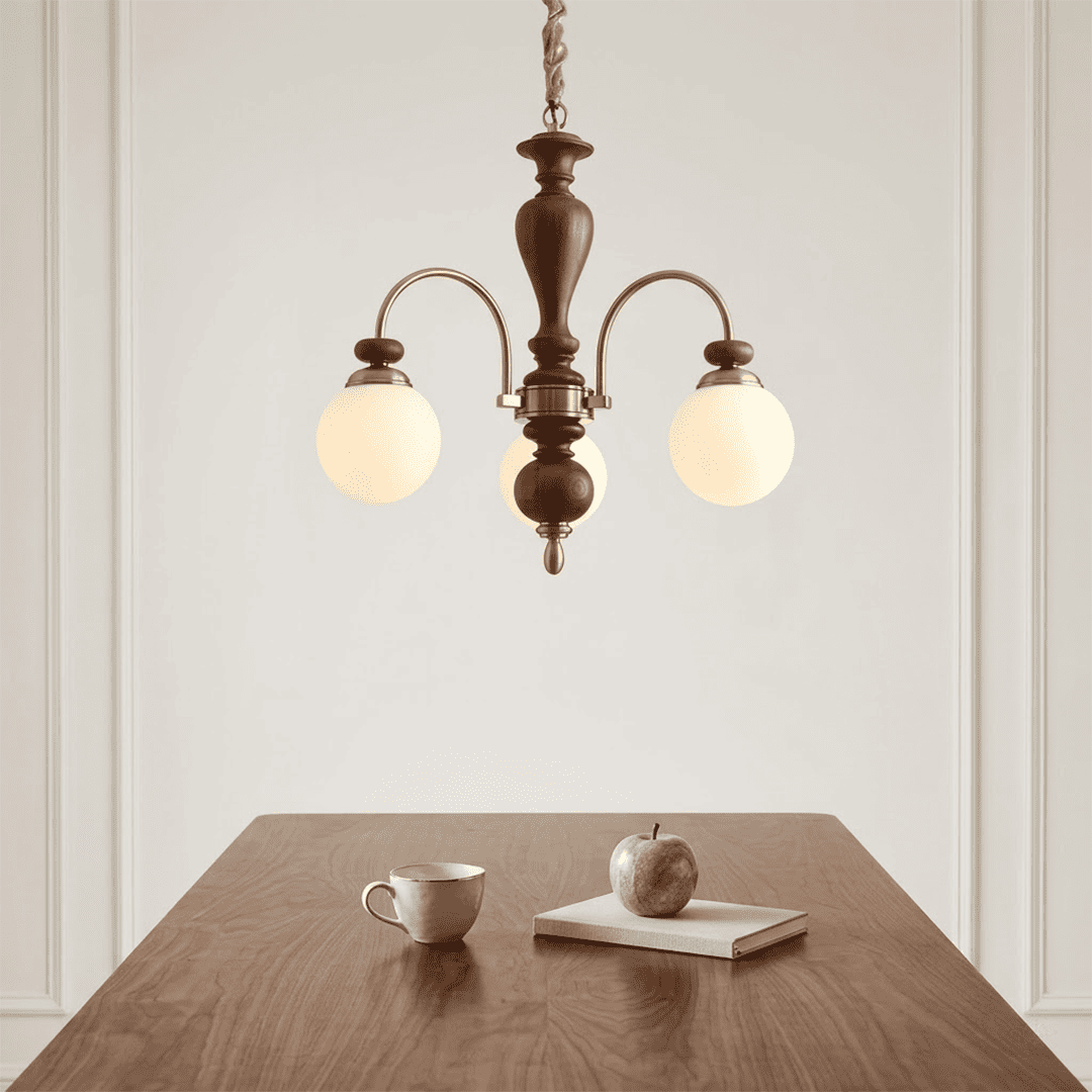 Windsor walnut chandelier  above dining table warm glowing light living room