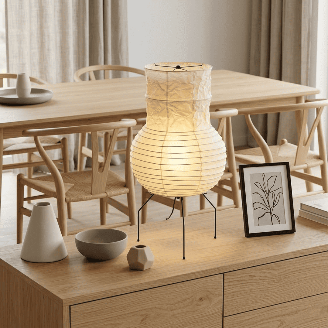 Handcrafted Zara Washi paper table lamp with unique crinkled texture and black tripod base in a Zen interior