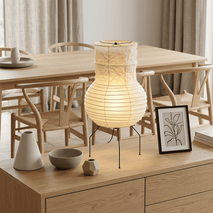 Handcrafted Zara Washi paper table lamp with unique crinkled texture and black tripod base in a Zen interior