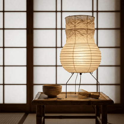 Handcrafted Zara Washi paper table lamp with unique crinkled texture and black tripod base in a Zen interior