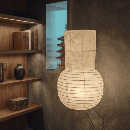 Handcrafted Zara Washi paper table lamp with unique crinkled texture and black tripod base in a Zen interior