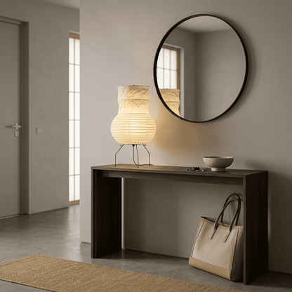 Handcrafted Zara Washi paper table lamp with unique crinkled texture and black tripod base in a Zen interior