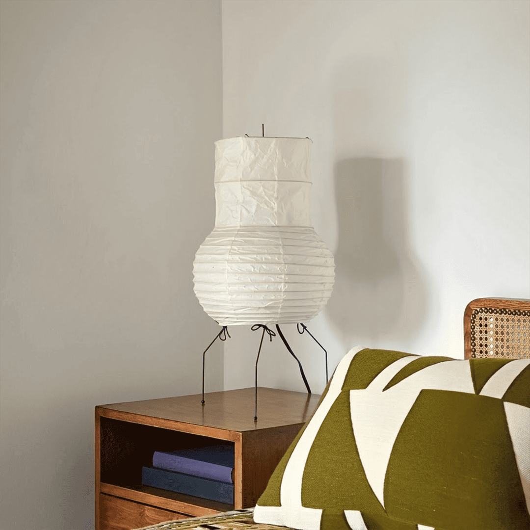 Handcrafted Zara Washi paper table lamp with unique crinkled texture and black tripod base in a Zen interior