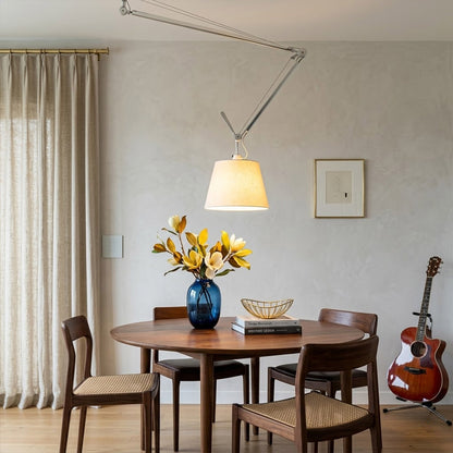 Tate industrial chandelier modernist dining room above rectangular table warm parchment glow minimalist interior