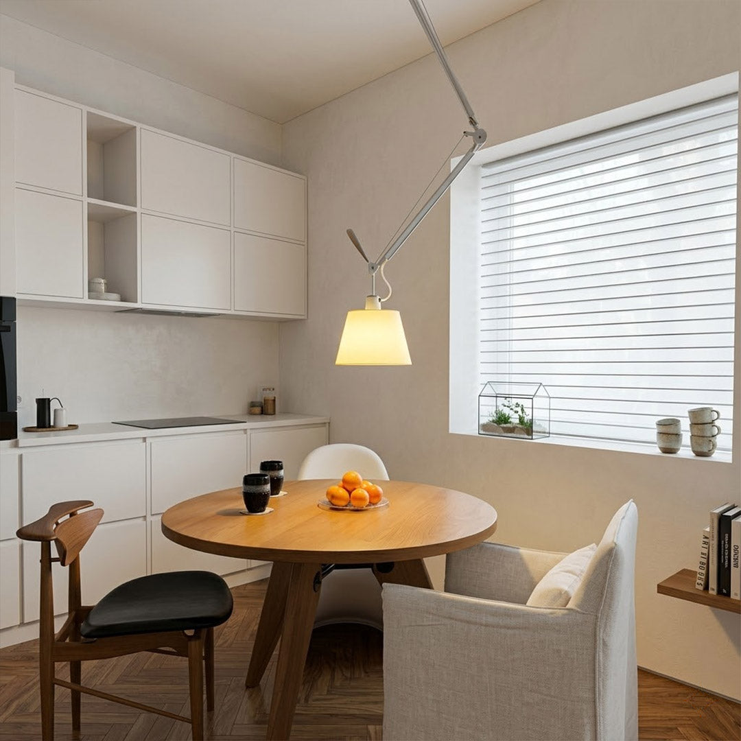 Tate industrial chandelier loft apartment dining table exposed brick walls aluminum frame parchment warm interior