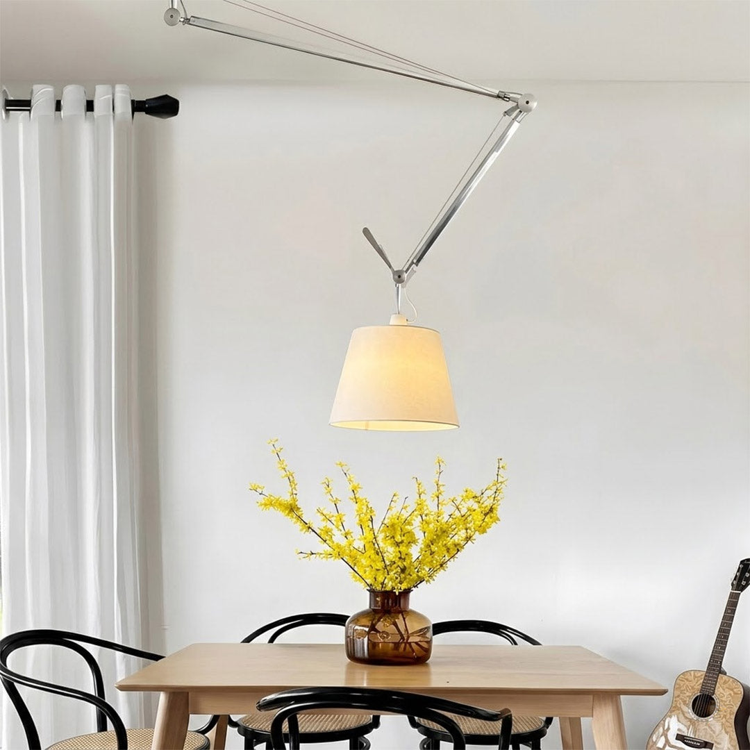 Tate industrial chandelier modernist dining room above rectangular table warm parchment glow minimalist interior