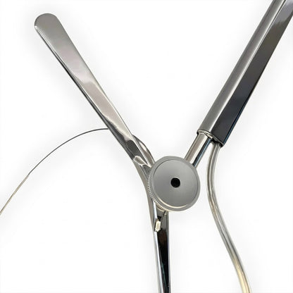 Tate brushed aluminum frame parchment paper shade close up material contrast industrial minimalist craftsmanship detail