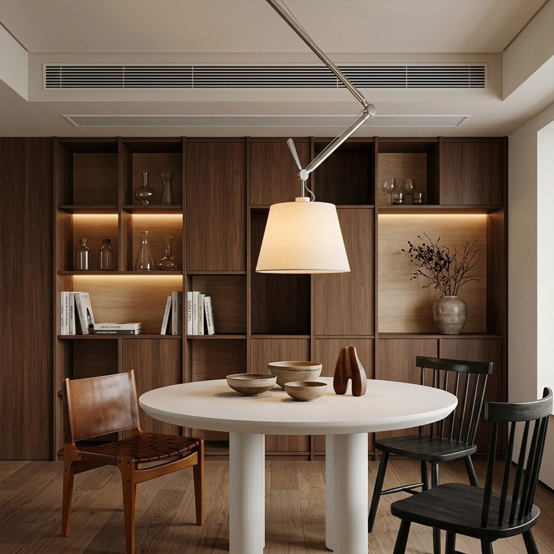 Tate industrial chandelier loft apartment dining table exposed brick walls aluminum frame parchment warm interior