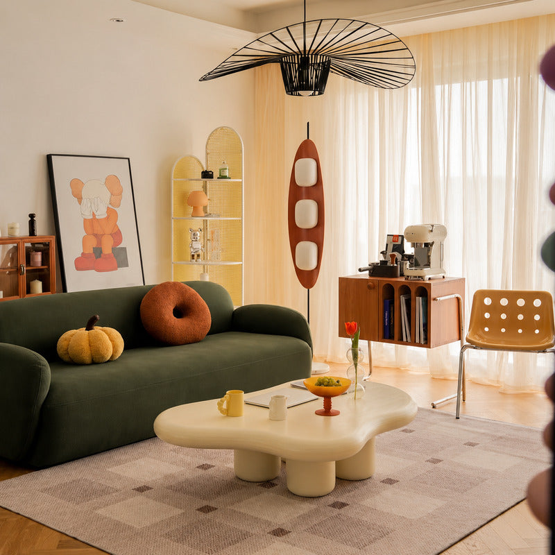 Tavola teak wood floor lamp filling a living room corner with a soft warm glow