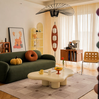 Tavola teak wood floor lamp filling a living room corner with a soft warm glow