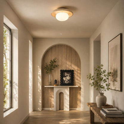 Tondo travertine ceiling light entryway foyer warm glow travertine stone glass flush mount American home lifestyle interior styled