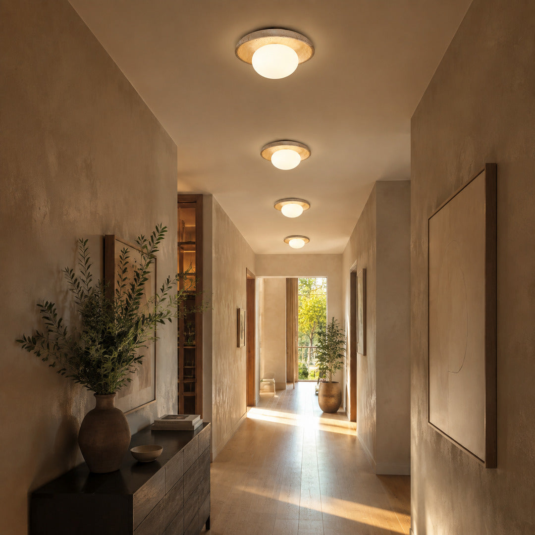 Tondo travertine ceiling light hallway corridor low ceiling warm glow travertine stone minimalist American home lifestyle interior styled