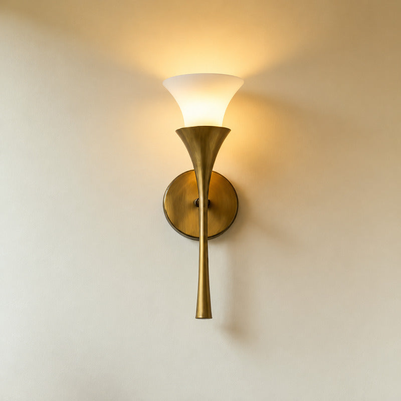 Detail of the tapered hourglass metal stem rising to the alabaster shade on the Torcia wall sconce