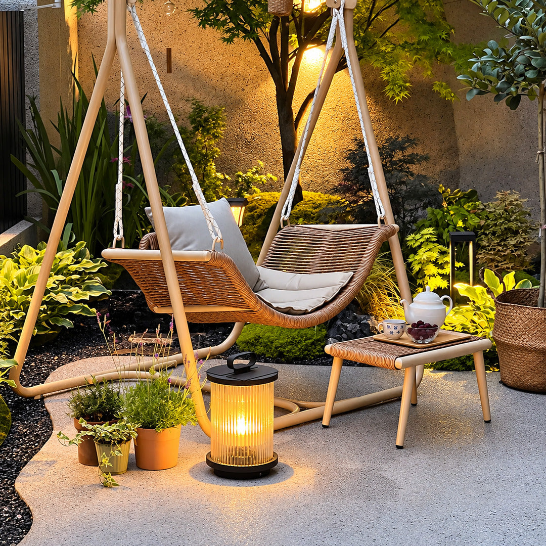 Tall Torre outdoor garden light standing as a floor lantern on a backyard deck