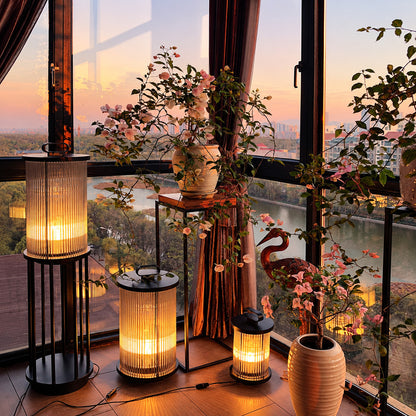 Pair of Torre outdoor garden lights framing a front entrance walkway with warm light