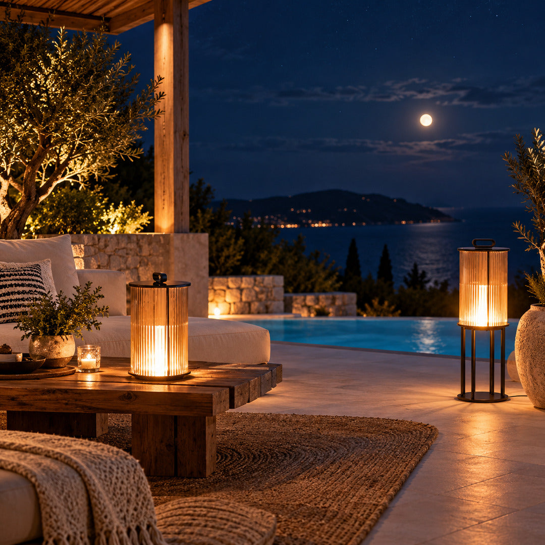 Torre outdoor garden lights lining a boutique hotel garden and poolside at dusk