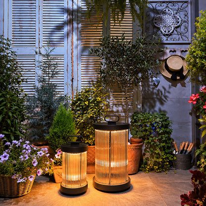 Torre outdoor garden lights illuminating a villa courtyard with a warm retro glow