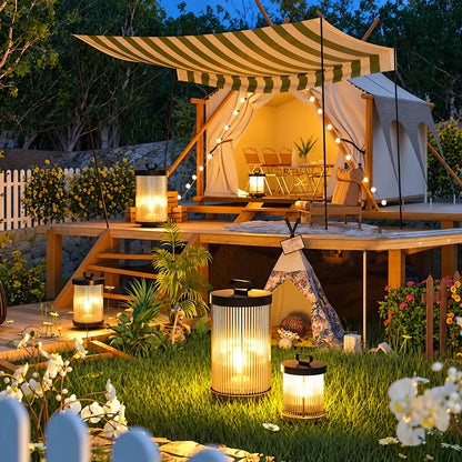 Torre outdoor garden light on a patio adding a warm ambient glow at night