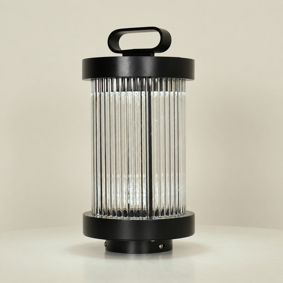 Close-up of the cylindrical frosted glass body of the Torre outdoor garden light
