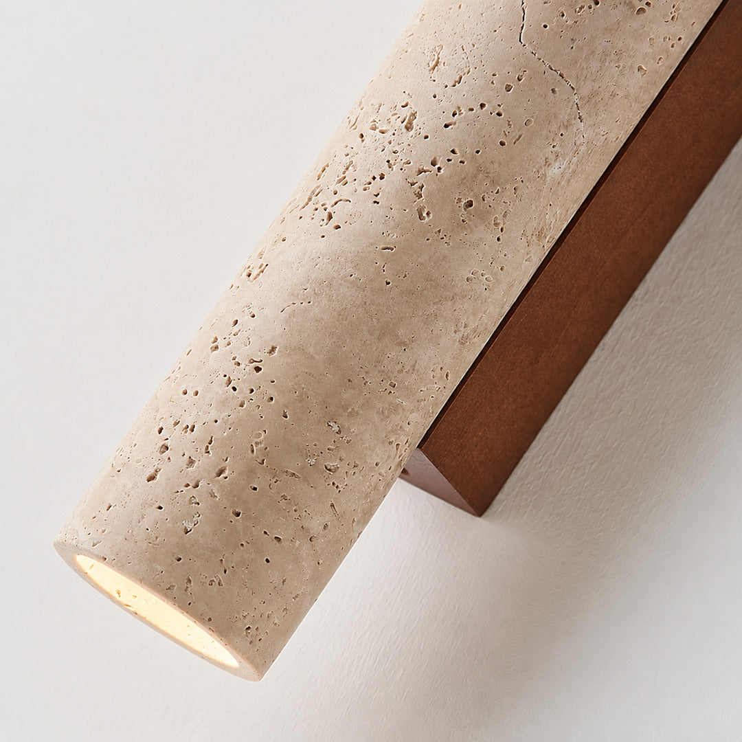 Torre travertine wall sconce yellow travertine natural stone veining porous texture column detail close up unique