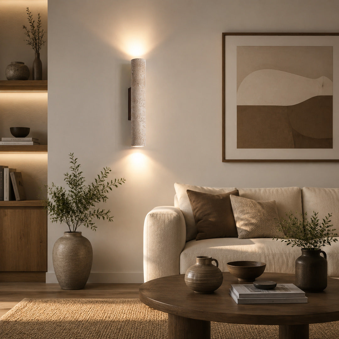 Torre travertine wall sconce living room wall warm glow travertine stone column sculptural American home lifestyle interior styled