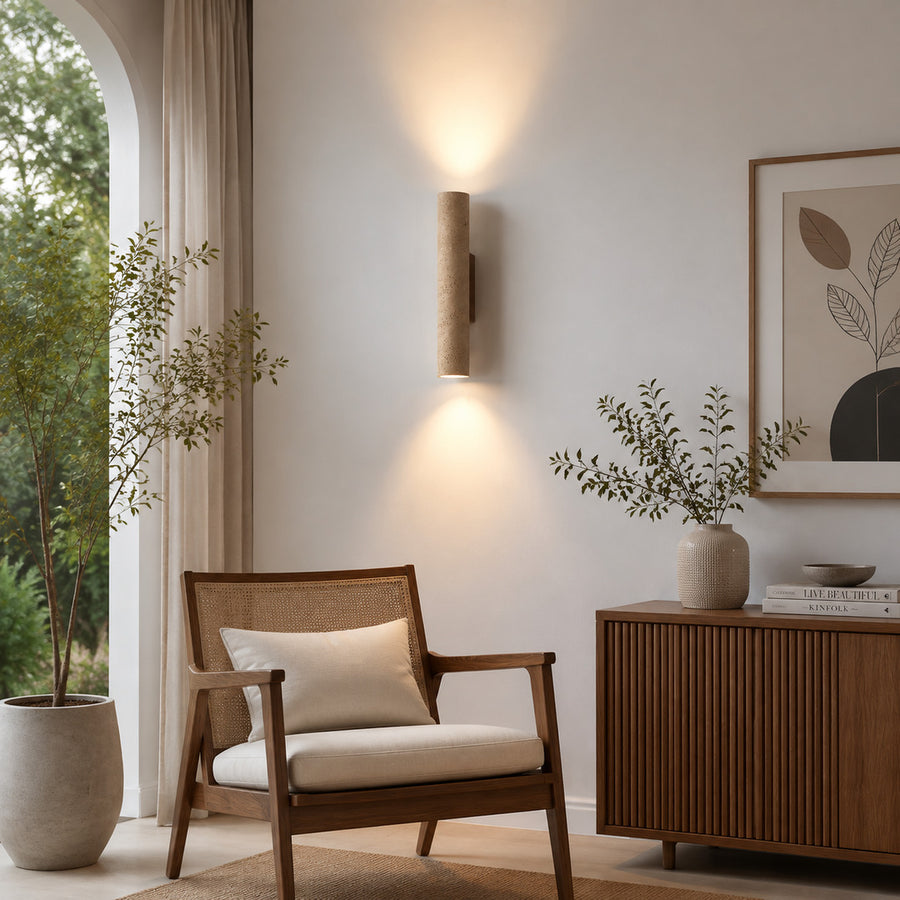 Torre travertine wall sconce living room wall warm glow travertine stone column sculptural American home lifestyle interior styled