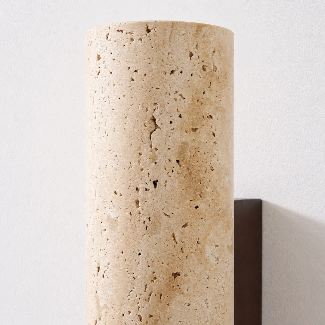 Torre travertine wall sconce yellow travertine natural stone veining porous texture column detail close up unique