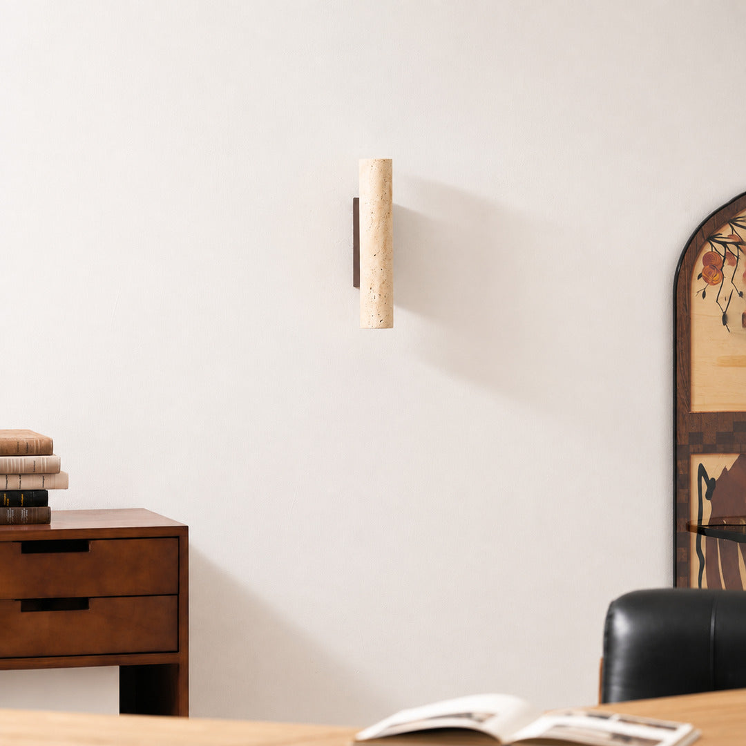 Torre travertine wall sconce living room wall warm glow travertine stone column sculptural American home lifestyle interior styled