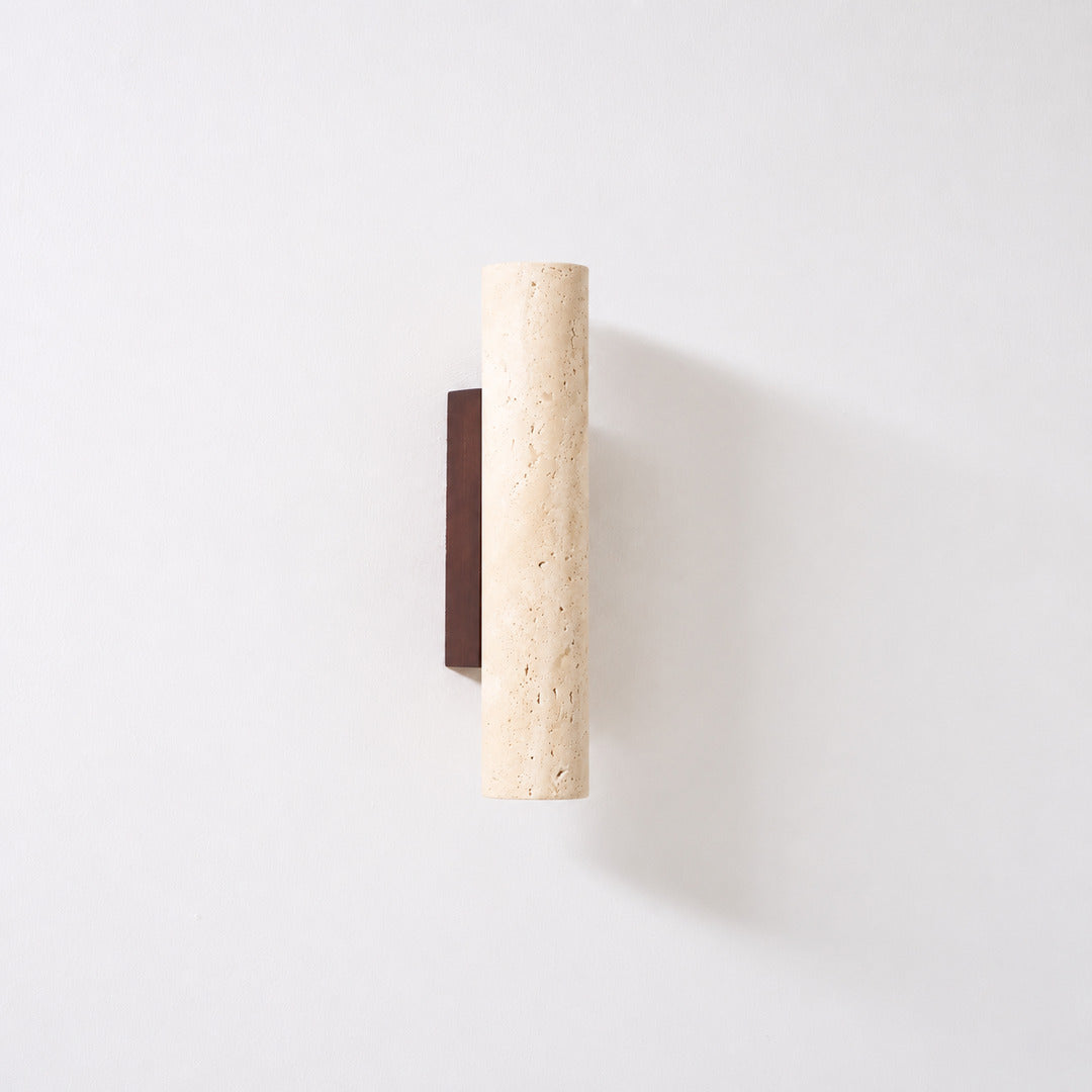 Torre travertine wall sconce yellow travertine stone column walnut wood minimalist sculptural white background