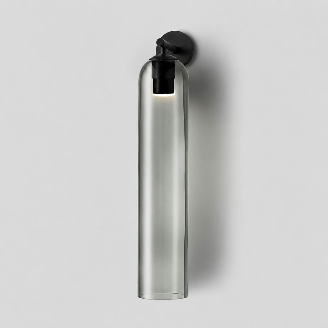 Torva glass wall sconce black smoke gray cylinder glass shade modern minimal white background front view
