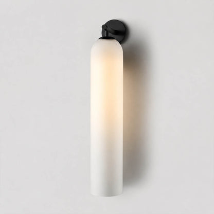 Torva glass wall sconce cylinder glass shade tube form detail close up craftsmanship translucent