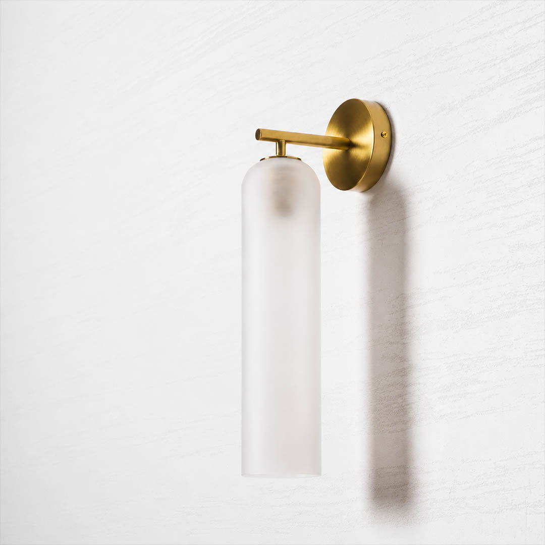 Torva glass wall sconce cylinder glass shade tube form detail close up craftsmanship translucent