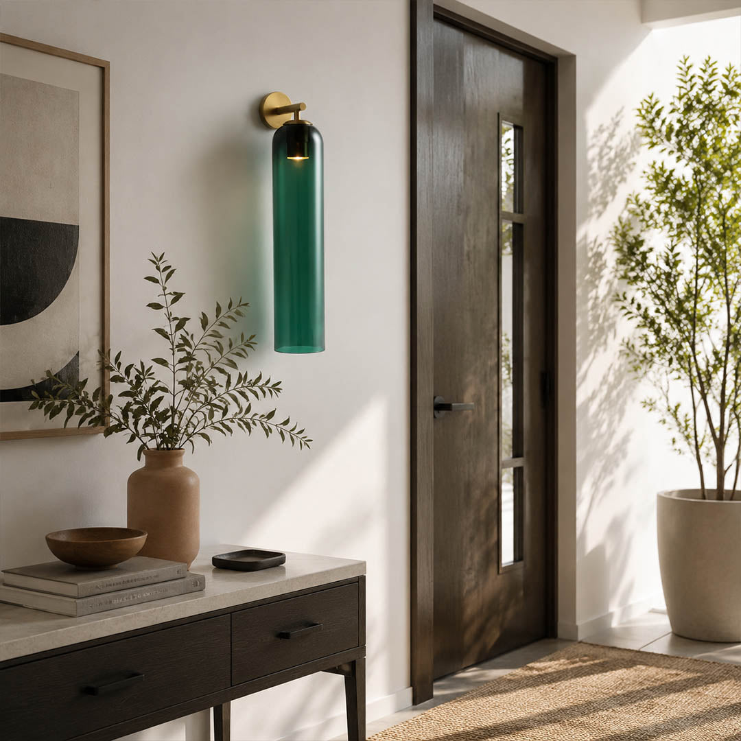 Torva glass wall sconce hallway corridor cylinder glass warm glow modern American home lifestyle interior styled