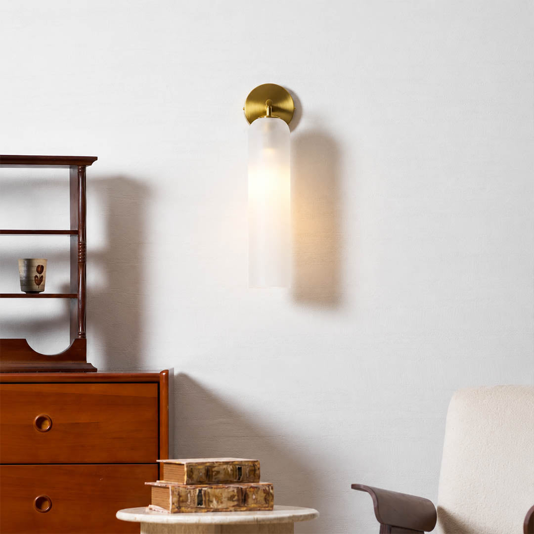Torva glass wall sconce hallway corridor cylinder glass warm glow modern American home lifestyle interior styled