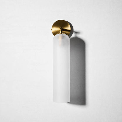 Torva glass wall sconce cylinder glass shade tube form detail close up craftsmanship translucent