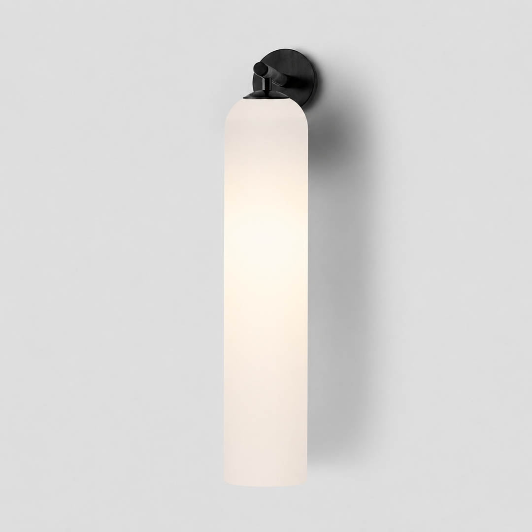Torva glass wall sconce gold clear cylinder glass shade modern minimal white background front view