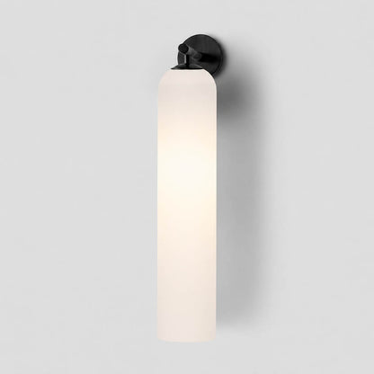 Torva glass wall sconce gold clear cylinder glass shade modern minimal white background front view