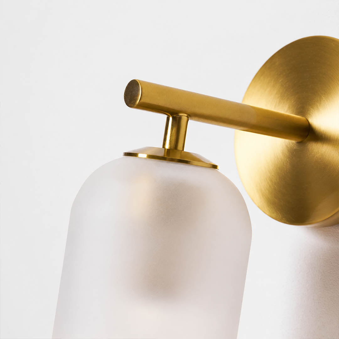 Torva glass wall sconce metal base hardware detail close up gold black sand nickel refined
