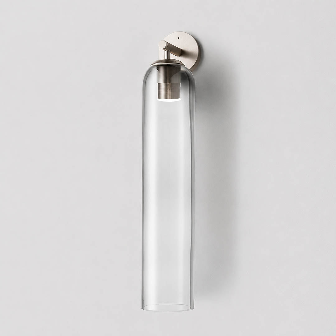 Torva glass wall sconce gold clear cylinder glass shade modern minimal white background front view