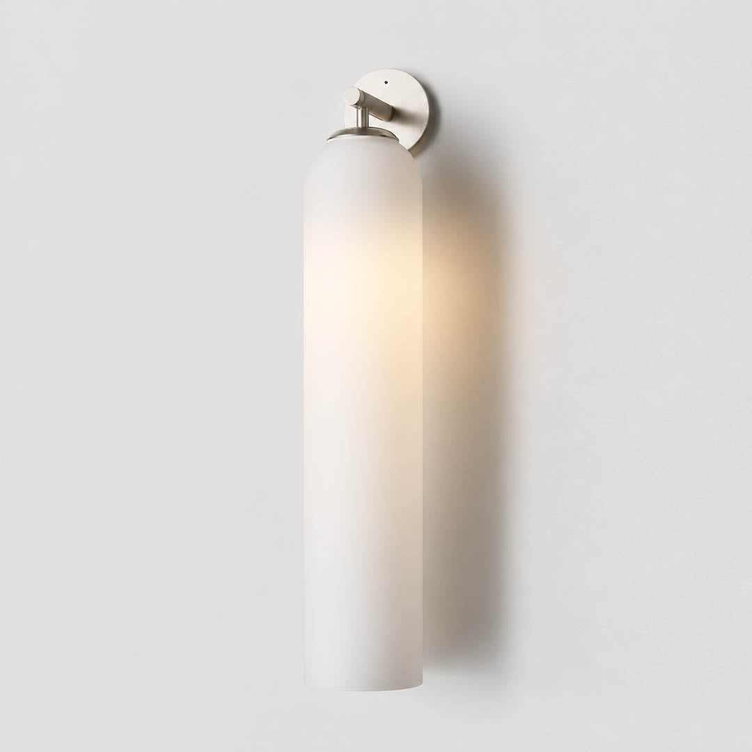 Torva glass wall sconce cylinder glass shade tube form detail close up craftsmanship translucent