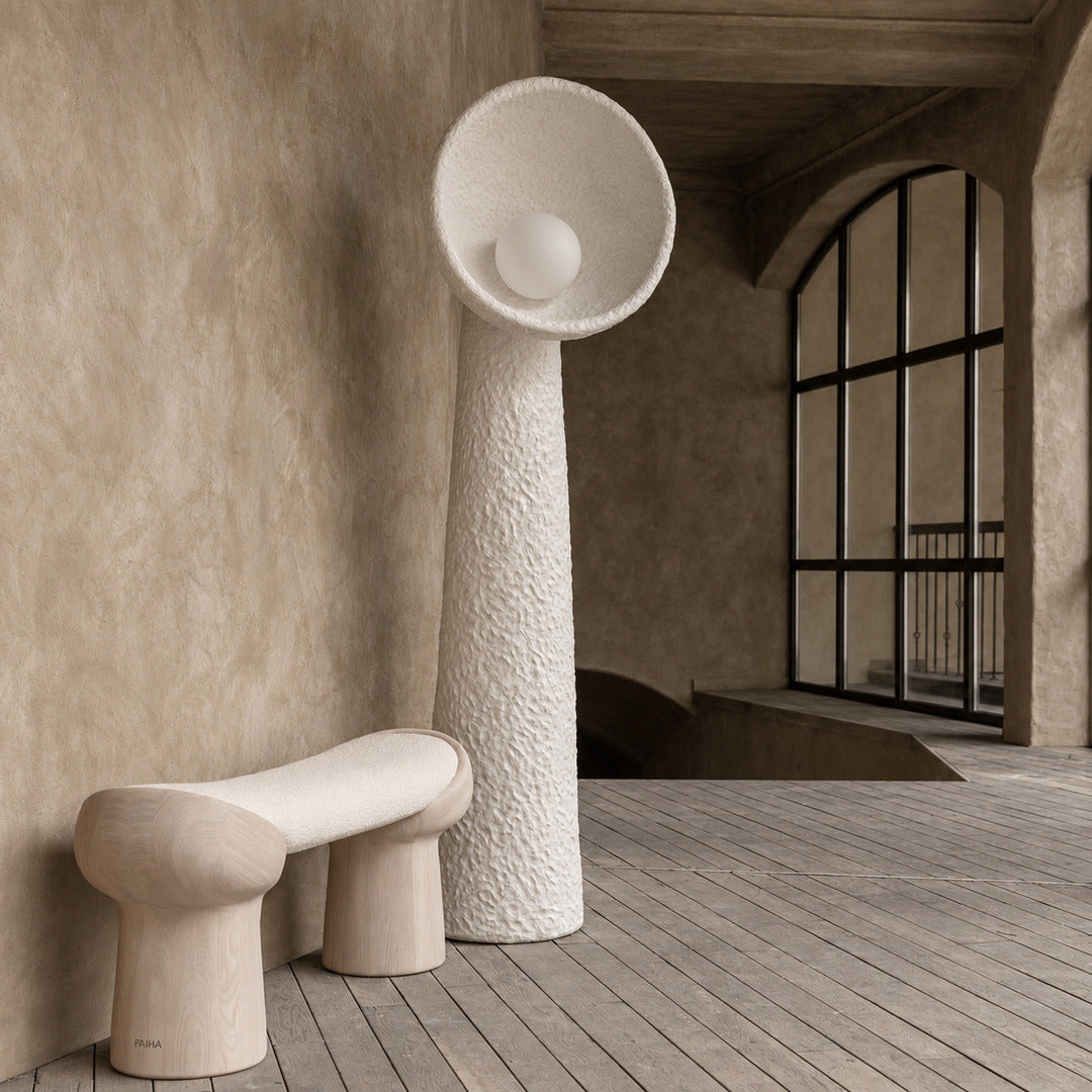 Totem sculptural floor lamp welcoming guests with a sculptural silhouette in an entryway
